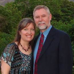 A person and person posing for a picture

Description automatically generated with medium confidence
